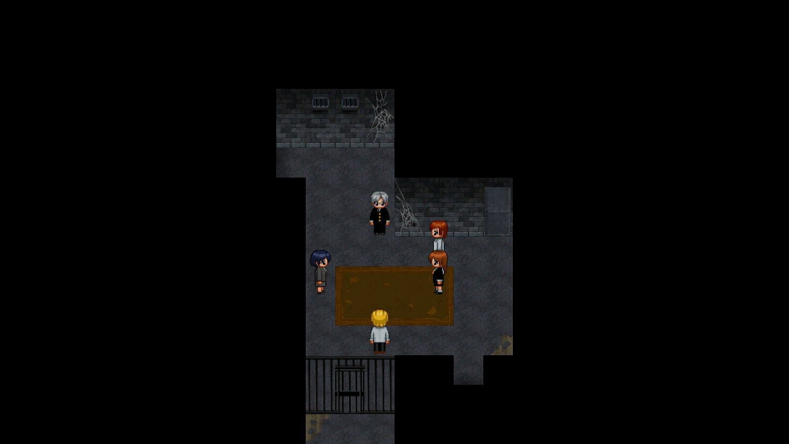 A top-down pixel art scene showing a small character with yellow hair standing in front of a brown table, surrounded by other tiny characters and a dark gray stone-like room, centered on a black background.