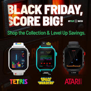 Advertisement for gaming watches with Tetris, Space Invaders, and Atari logos on a dark background.