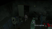 Dark medical office with medical equipment and a person walking.
