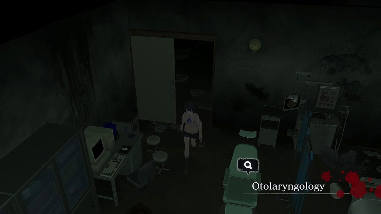 Dark medical office with medical equipment and a person walking.