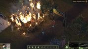 Game screen showing a fiery structure with characters around it