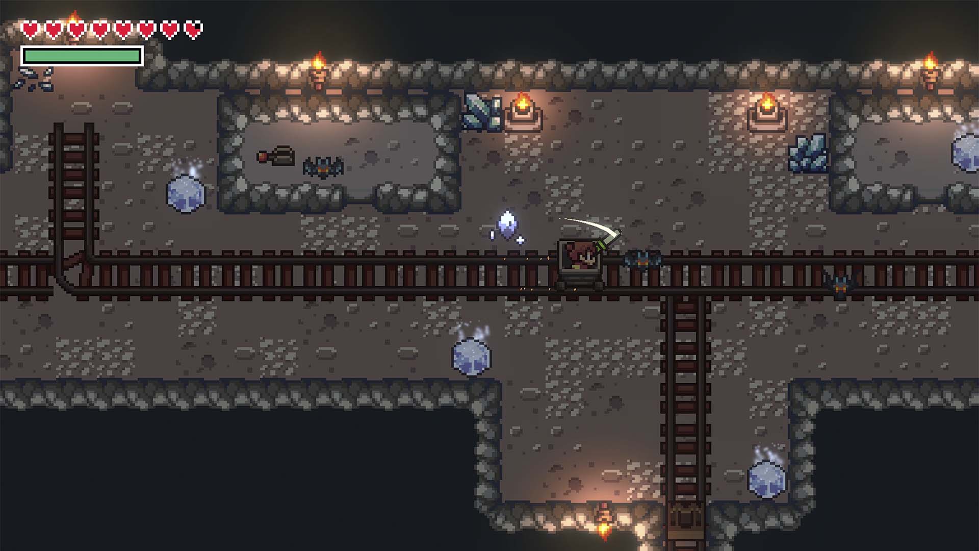 Pixel art screenshot of a top-down dungeon or minecart track scene with stone walls, torches, ladders, and small game elements.