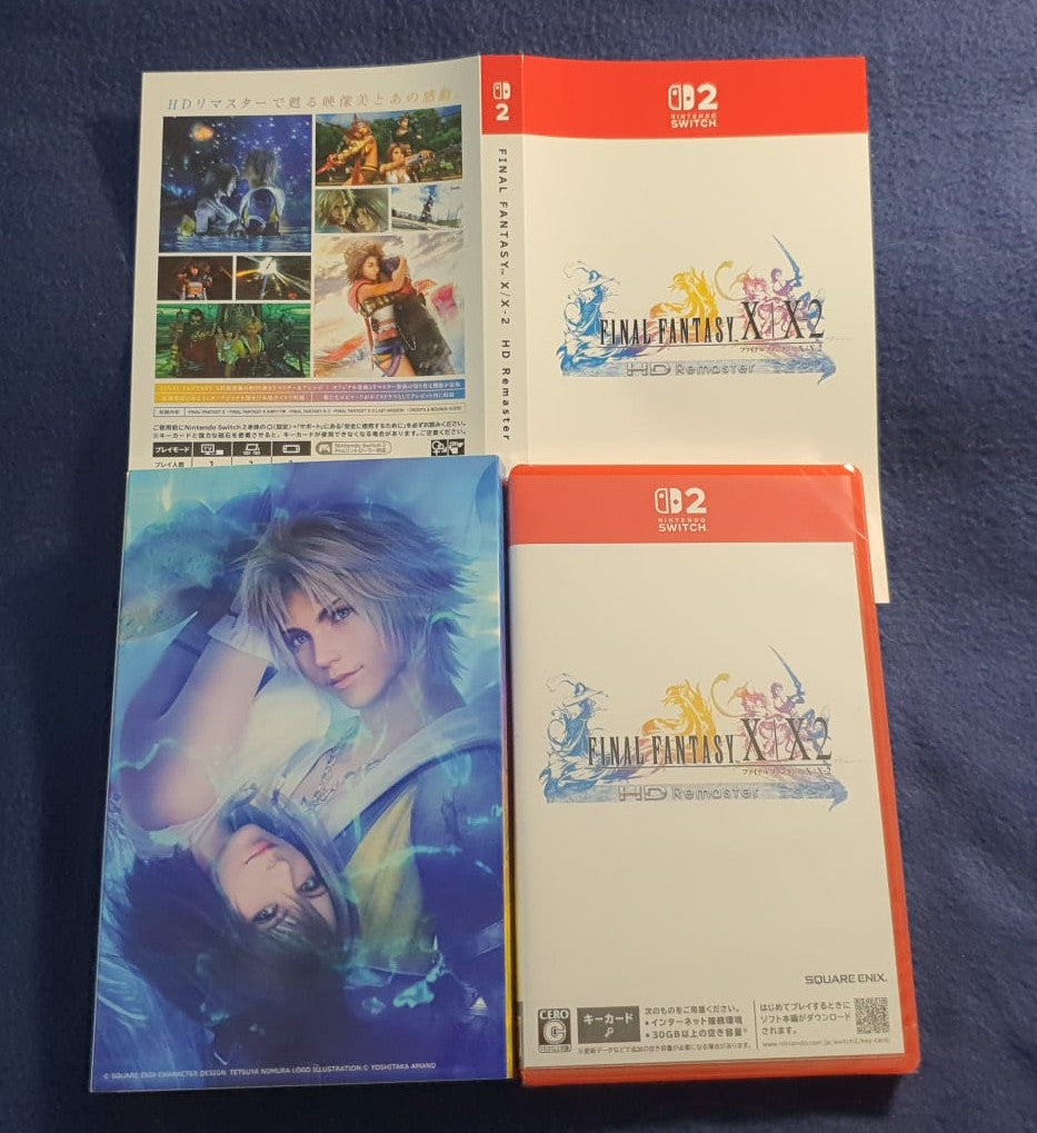 A Nintendo Switch 2 bundle for Final Fantasy XV, including a game case, a manual, and a poster, displayed on a dark blue textured fabric background.