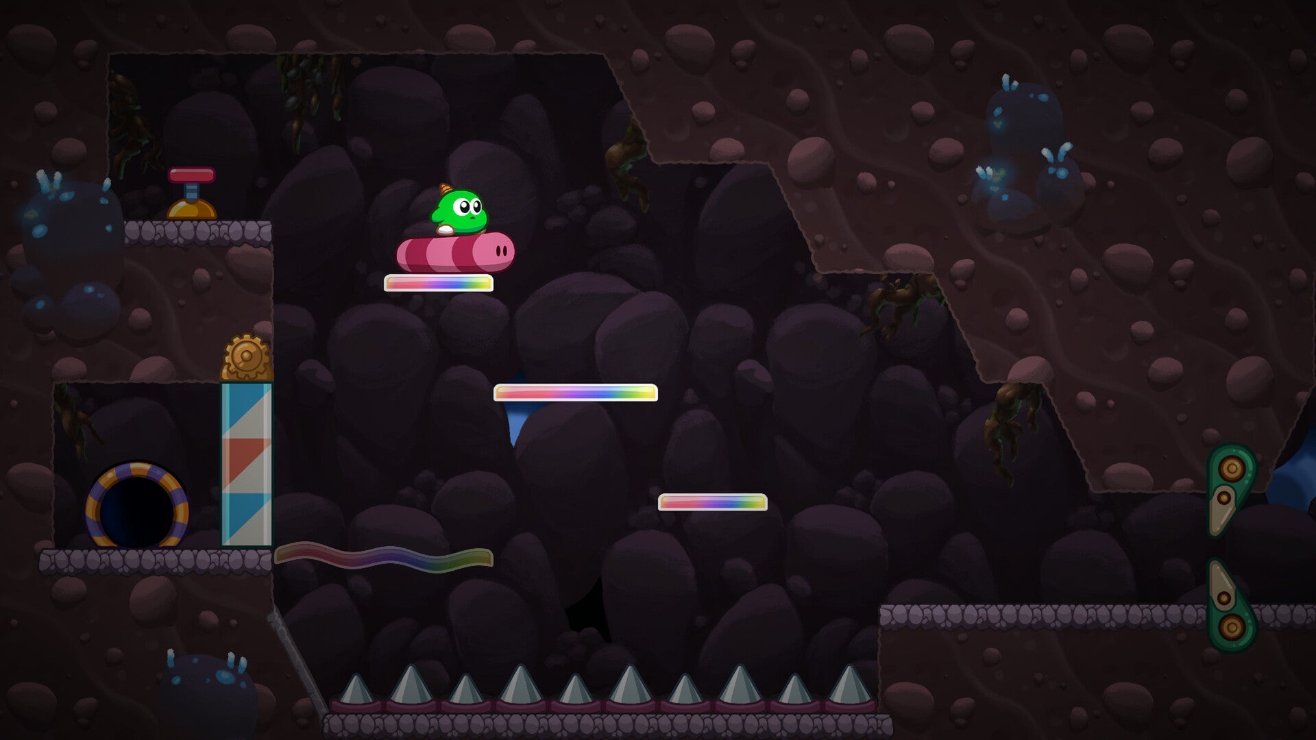 Game level with a character on a dark platform, surrounded by glowing elements.