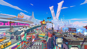 Colorful futuristic cityscape with tall buildings and a clear blue sky.