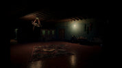A dark, atmospheric interior room with a low hanging chandelier, a patterned rug on the floor, and a faint light source on the back wall.
