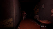 A dimly lit video game scene showing a player character running down a dark hallway with red-tiled flooring, textured walls, circular wall decorations, and a small table in the foreground.