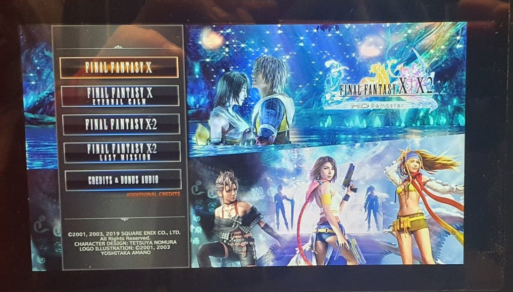 Menu screen from 'Final Fantasy X' with character images and options.