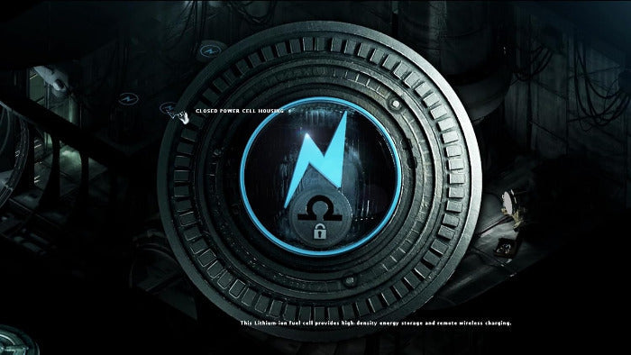A circular metallic device with a glowing blue lightning bolt and lock icon in the center, set against a dark industrial background. Small text is visible near the top and bottom of the image.