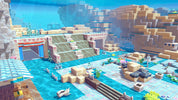 A blocky, voxel-style digital scene showing a desert canyon landscape with turquoise water, sandy structures, stairs, and small character figures in the foreground.