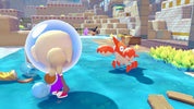 A stylized 3D game scene showing a small beige character inside a large translucent blue bubble, standing in bright blue water and facing an orange crab-like creature. The background includes blocky stone structures, crates, and green plants in a colorful digital environment.