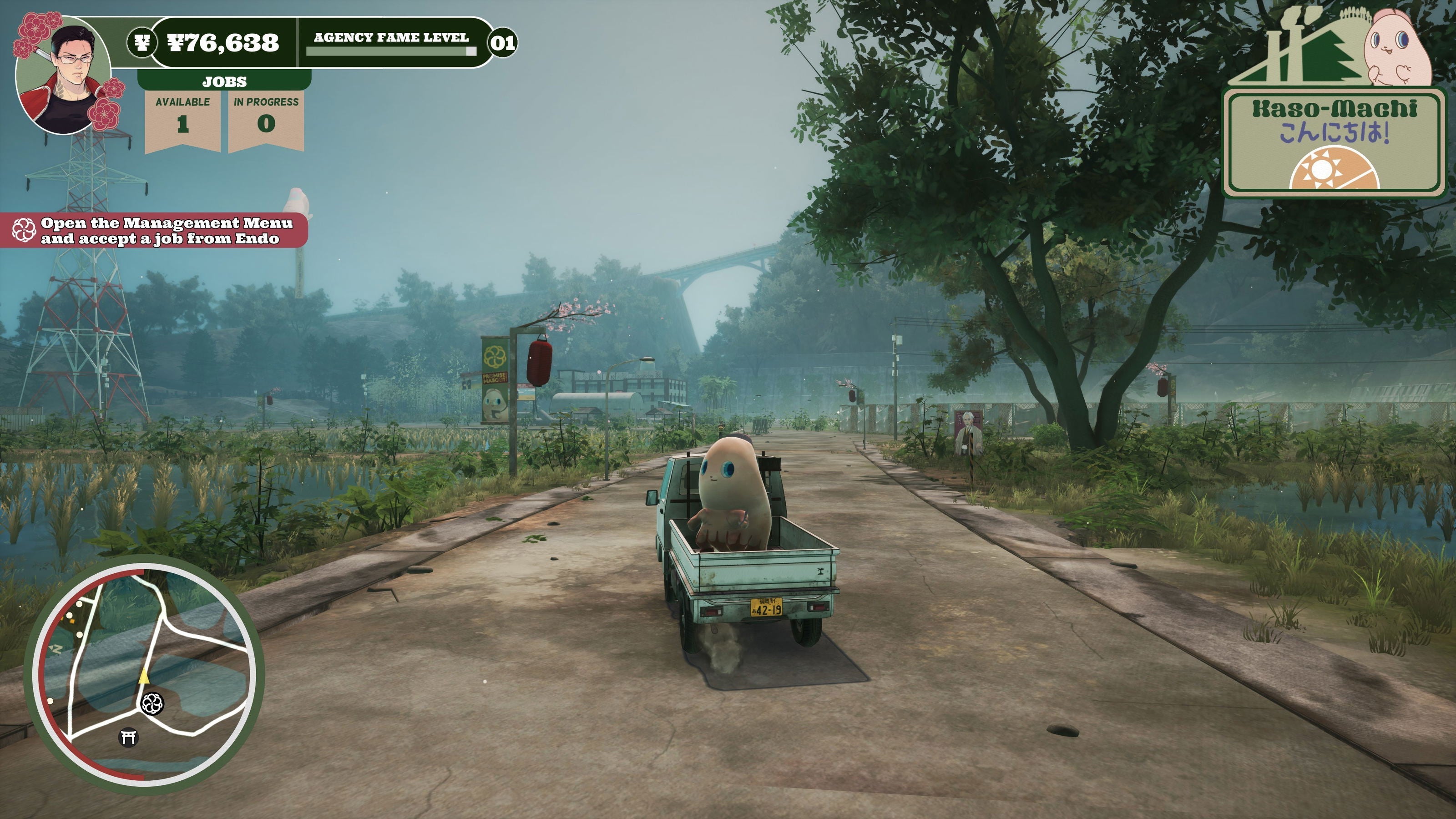 Game screen showing a truck with a character in the back on a road with trees and water in the background.