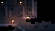 Dark, eerie room with candles and a stone wall.
