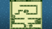 Game screen with a maze-like layout and characters on a blue background with snowflake pattern