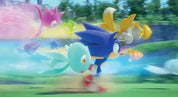 A colorful 3D-rendered scene featuring Sonic the Hedgehog running forward with several friends and pets flying or running around him in a bright outdoor-style setting.