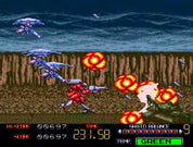 Vintage video game screen with space-themed action, featuring characters and explosions.