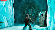 Person in a fantasy setting with ice walls and a large emblem.