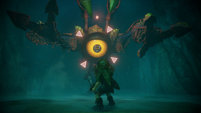 A dark fantasy scene showing a small green character standing beneath a giant insect-like creature with a glowing yellow eye and pink triangular markings in a dim teal environment.