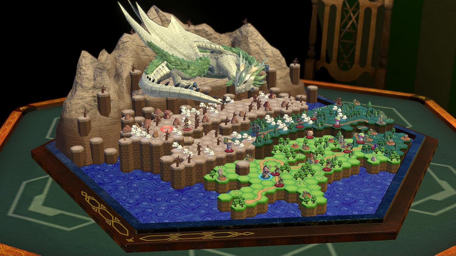 Model of a fantasy landscape with a dragon, castle, and various characters on a table.
