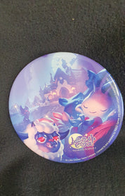 A round pin badge featuring colorful fantasy characters from the game 'Black Myth: Wukong' on a dark textured background.