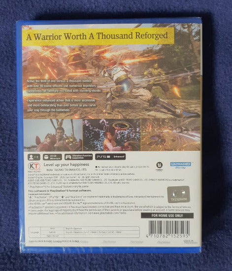 Back cover of the video game 'A Warrior Worth A Thousand Reforged' for PlayStation 4, shown in its shrink wrap on a textured blue fabric background.