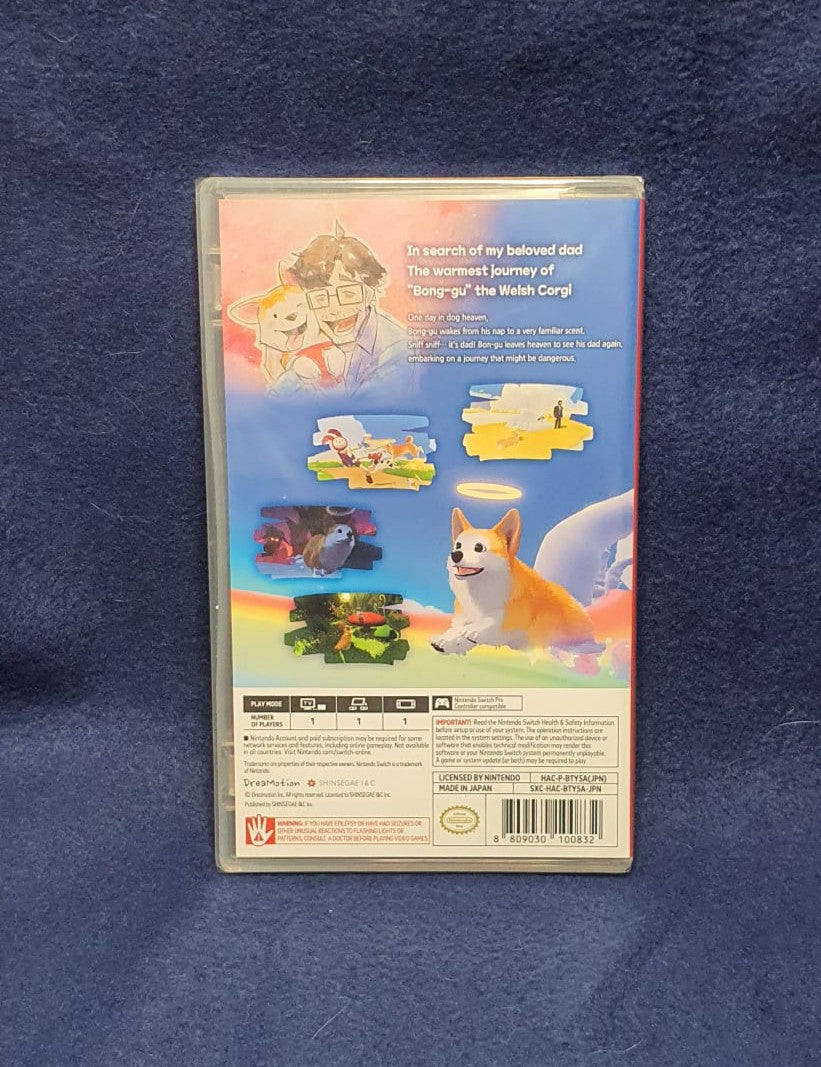 The back cover of a VHS case for the movie 'Bong Jai' (The Lost Dog), featuring colorful illustrations of a dog and a man, photographed on a textured blue fabric background.