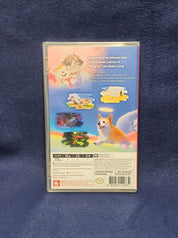 The back cover of a VHS case for the movie 'Bong Jai' (The Lost Dog), featuring colorful illustrations of a dog and a man, photographed on a textured blue fabric background.