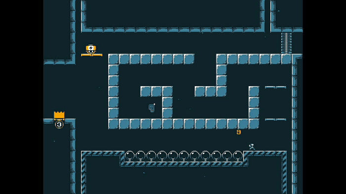 Top-down pixel art scene showing a small blue character navigating a maze with blue block walls, dark teal background, and small yellow/orange item icons.