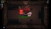Pixel art scene from a video game showing a red blob-like character tied to a white skull-like creature in a dark stone chamber, with multiple red enemies above and game UI elements along the edges.